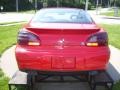 2003 Victory Red Pontiac Grand Prix GT Sedan  photo #3