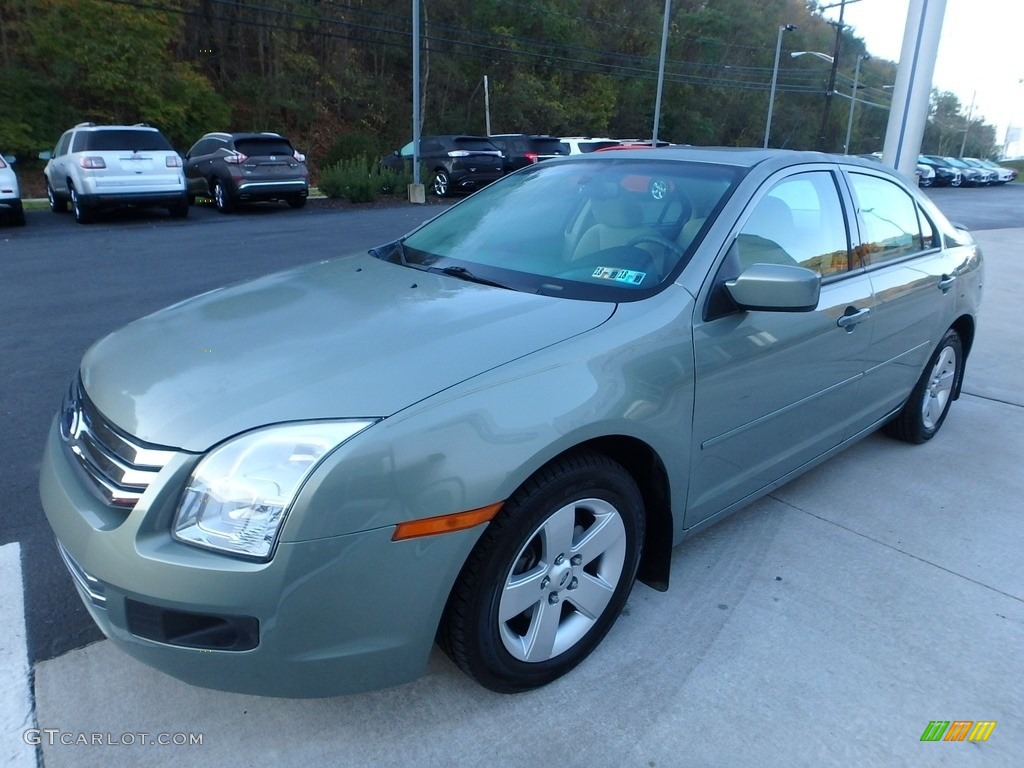 2009 Fusion SE V6 - Moss Green Metallic / Medium Light Stone photo #6