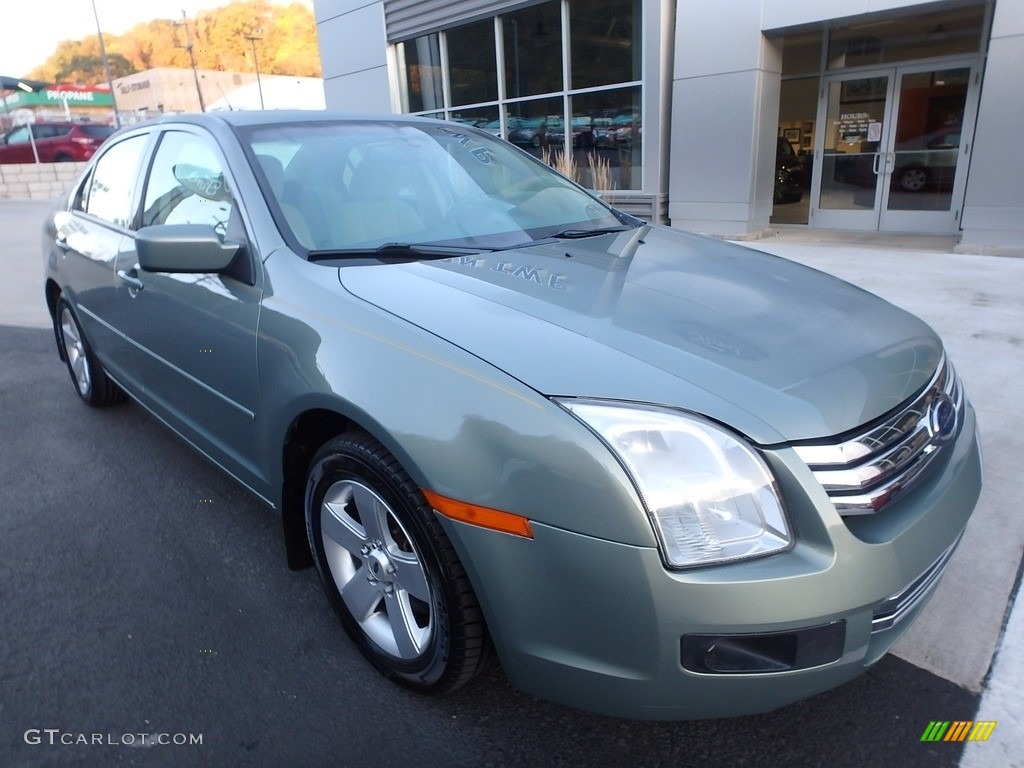 2009 Fusion SE V6 - Moss Green Metallic / Medium Light Stone photo #8