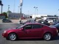 2008 Red Jewel Pontiac Grand Prix Sedan  photo #2