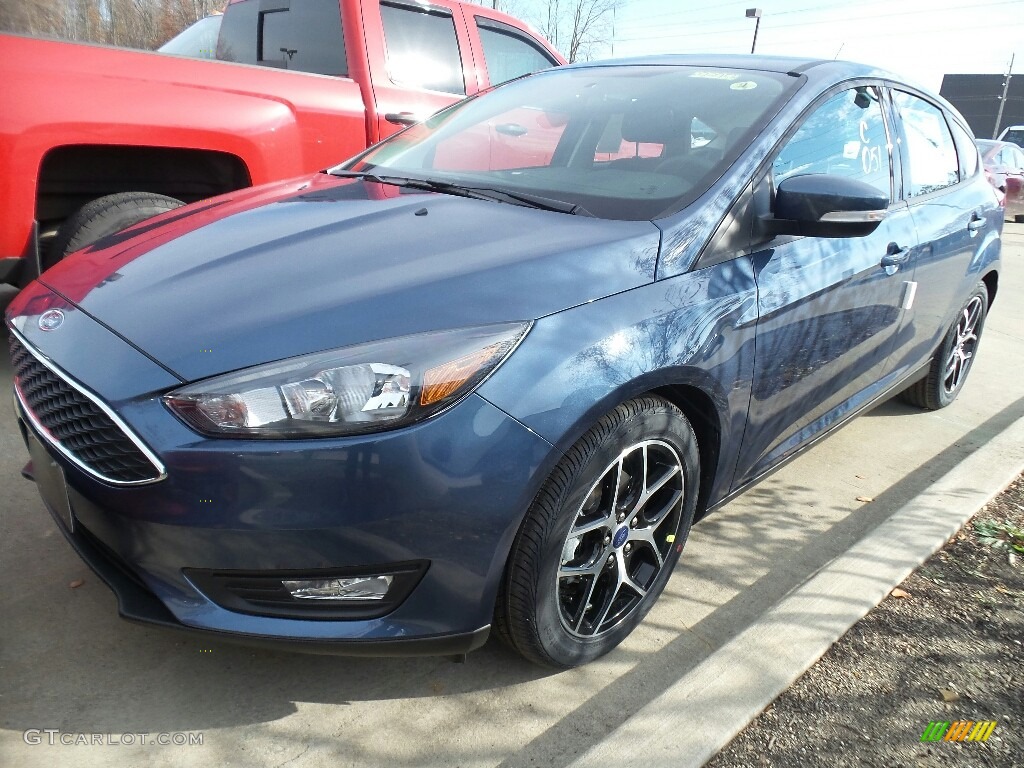 Blue Metallic 2018 Ford Focus SEL Hatch Exterior Photo #123973416