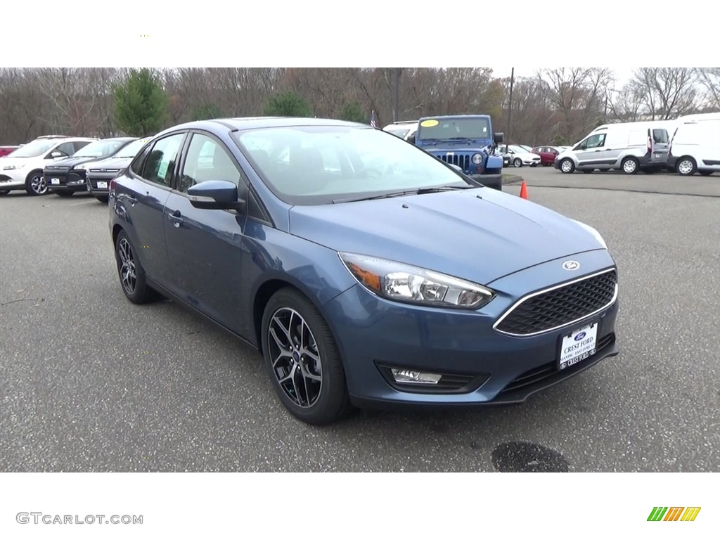 2018 Focus SEL Sedan - Blue Metallic / Charcoal Black photo #1