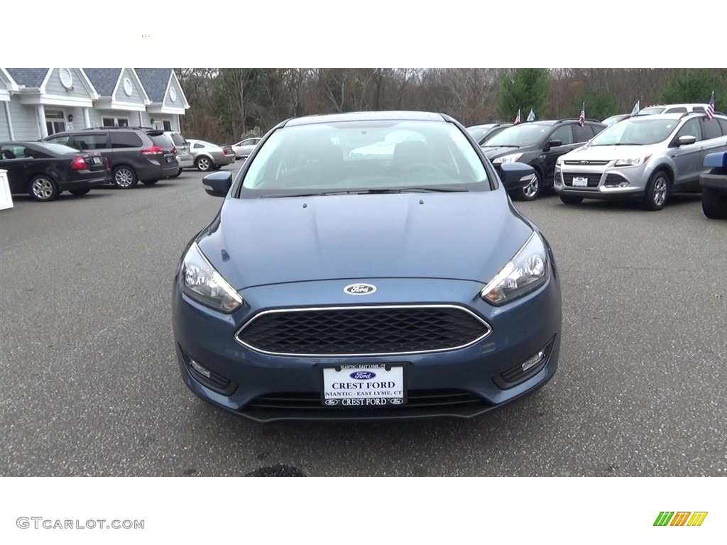 2018 Focus SEL Sedan - Blue Metallic / Charcoal Black photo #2