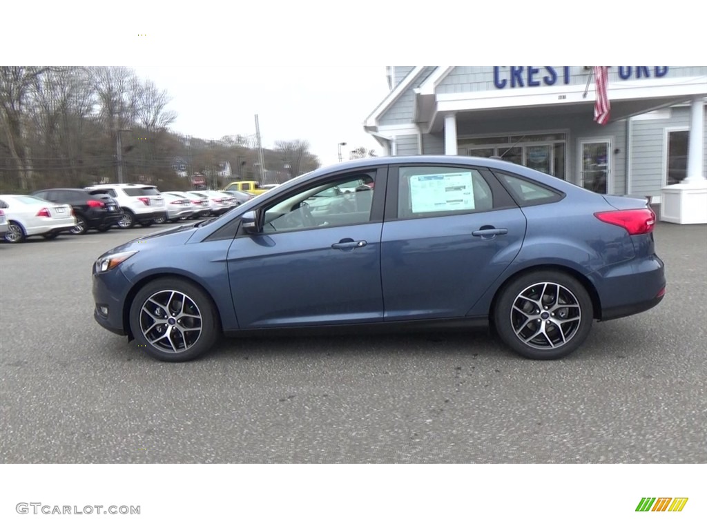 2018 Focus SEL Sedan - Blue Metallic / Charcoal Black photo #4