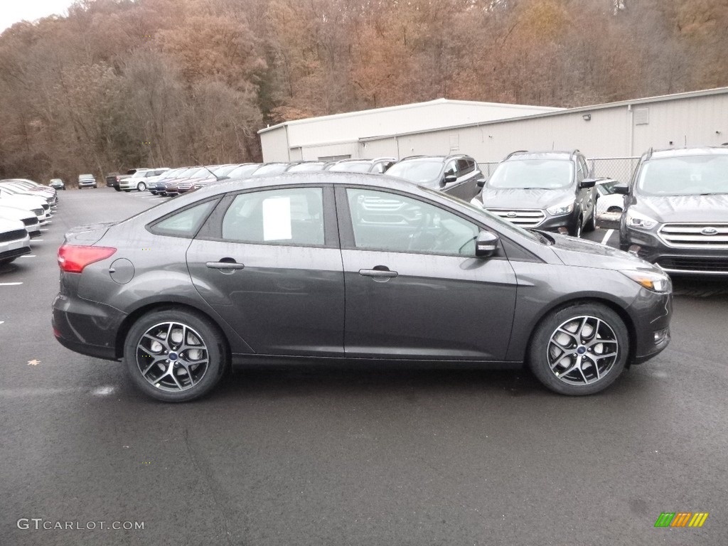 2018 Focus SEL Sedan - Magnetic / Charcoal Black photo #1