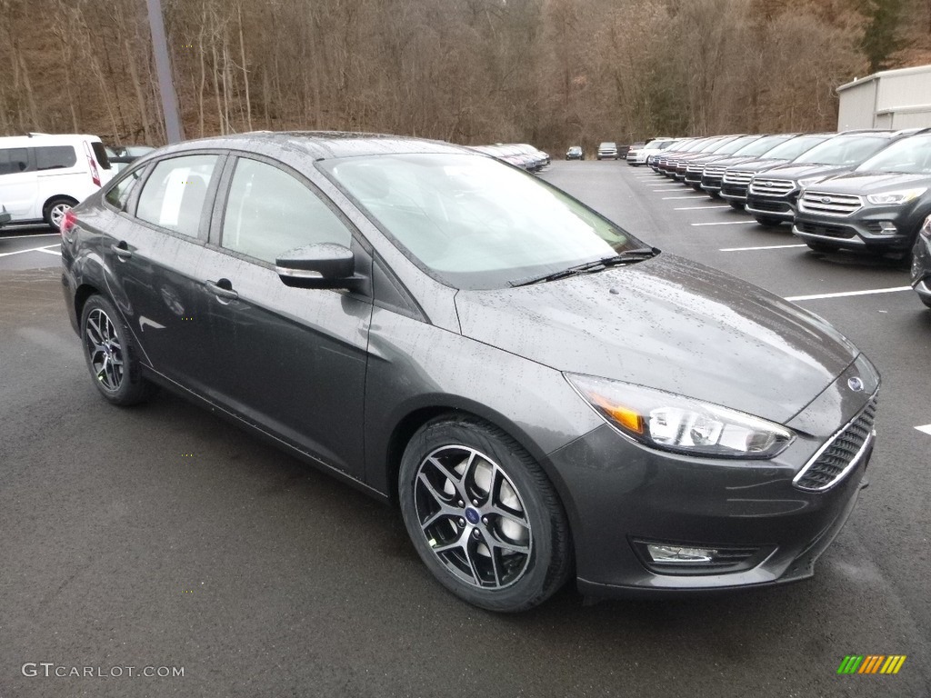 2018 Focus SEL Sedan - Magnetic / Charcoal Black photo #3