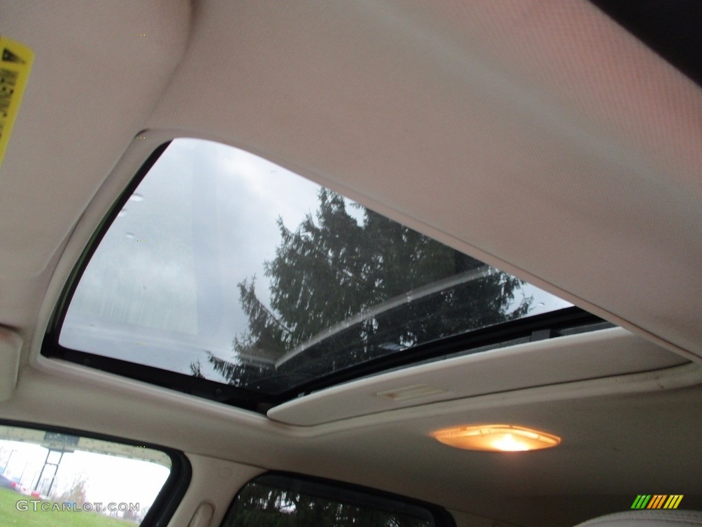 2010 Mariner I4 4WD - White Suede / Stone photo #24