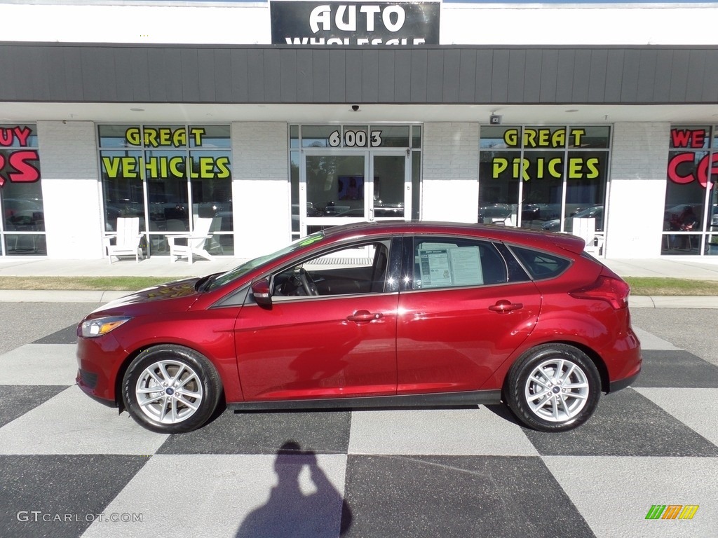 2016 Focus SE Hatch - Ruby Red / Charcoal Black photo #1