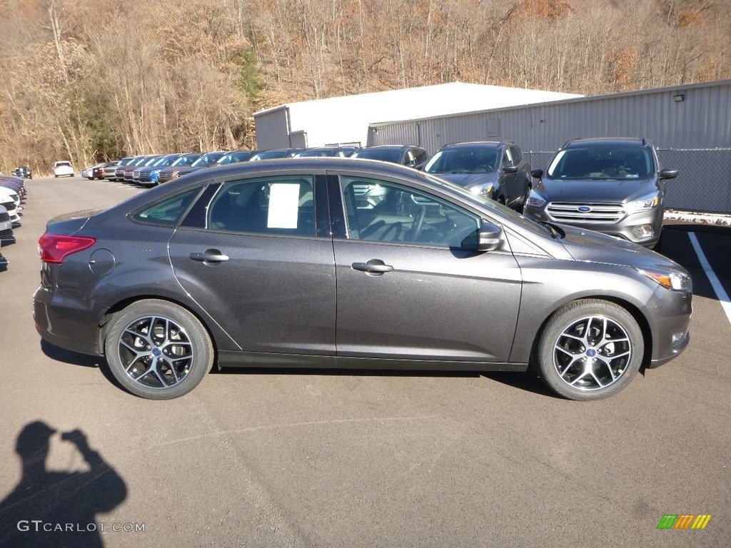 2018 Focus SEL Sedan - Magnetic / Charcoal Black photo #1