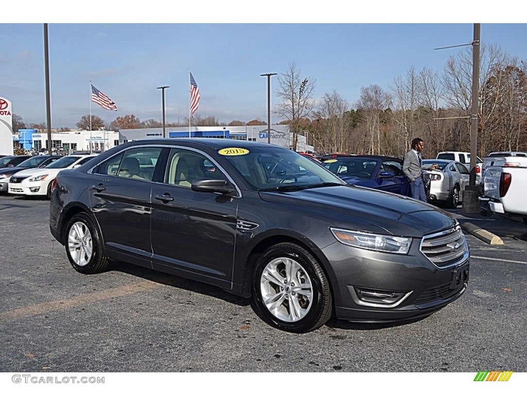 2015 Taurus SEL - Magnetic Metallic / Dune photo #1