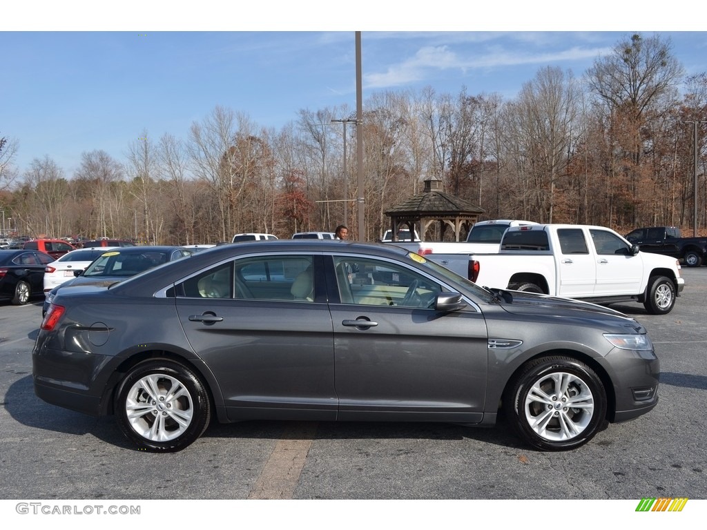 2015 Taurus SEL - Magnetic Metallic / Dune photo #2