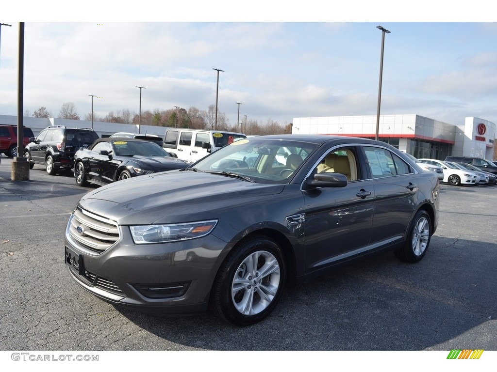 2015 Taurus SEL - Magnetic Metallic / Dune photo #7
