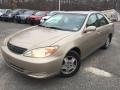 2003 Desert Sand Mica Toyota Camry LE V6  photo #1