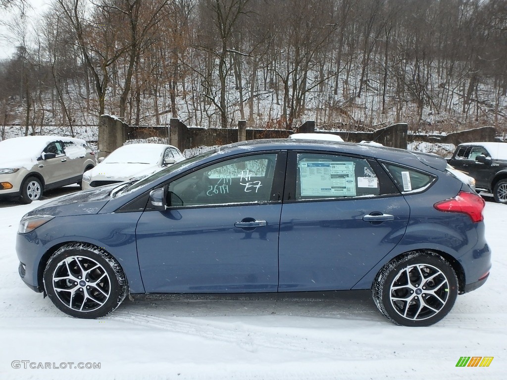 Blue Metallic 2018 Ford Focus SEL Hatch Exterior Photo #124685013