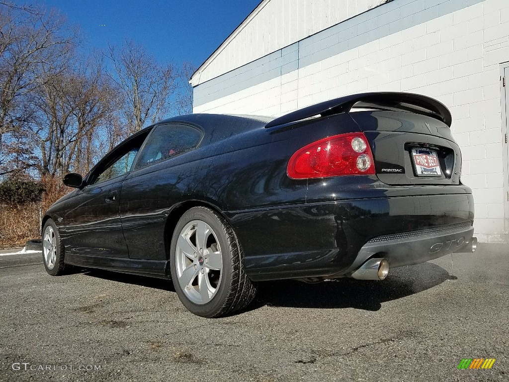 2005 GTO Coupe - Phantom Black Metallic / Red photo #2