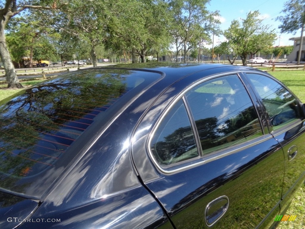 2004 Grand Am SE Sedan - Black / Dark Pewter photo #21