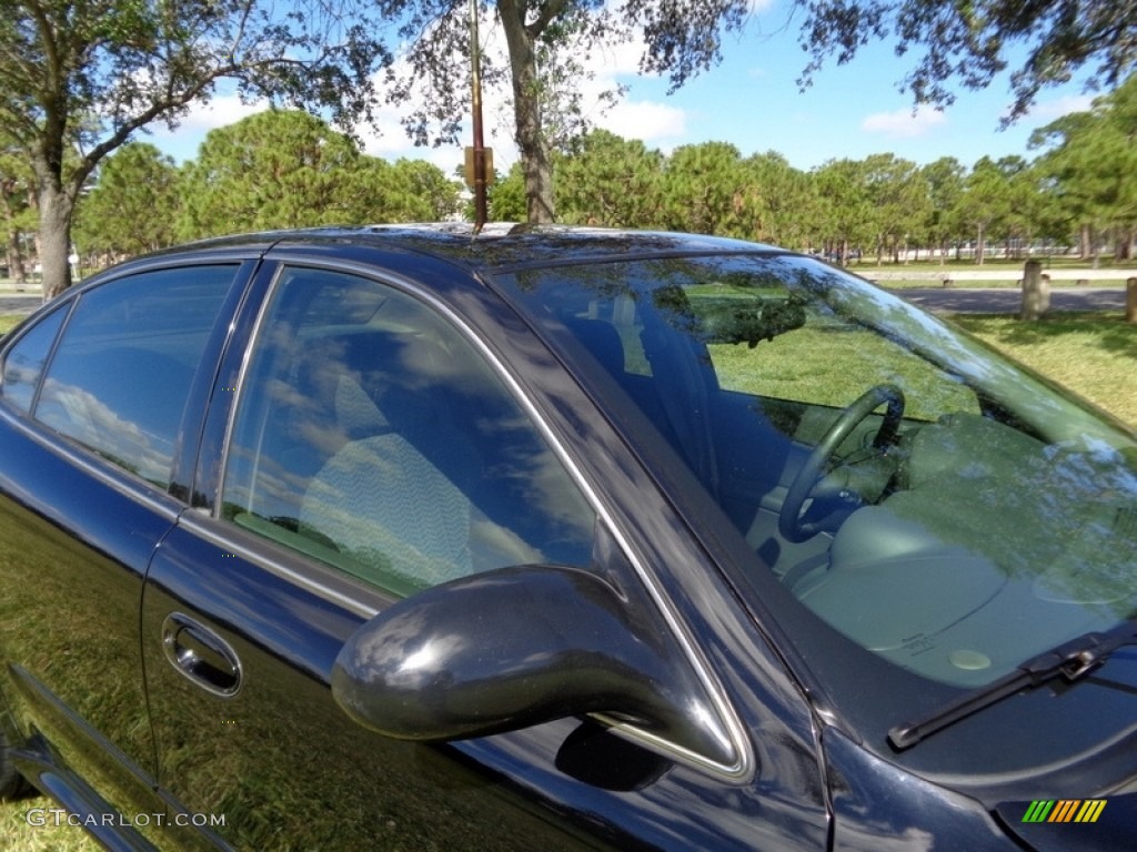 2004 Grand Am SE Sedan - Black / Dark Pewter photo #23