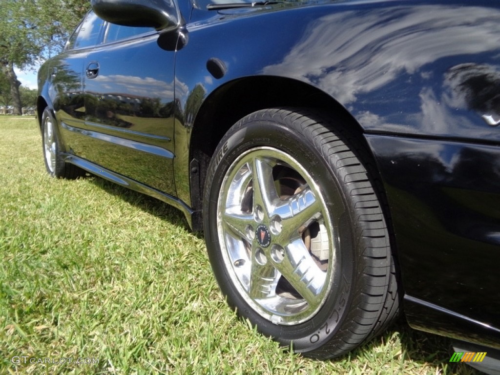 2004 Grand Am SE Sedan - Black / Dark Pewter photo #27