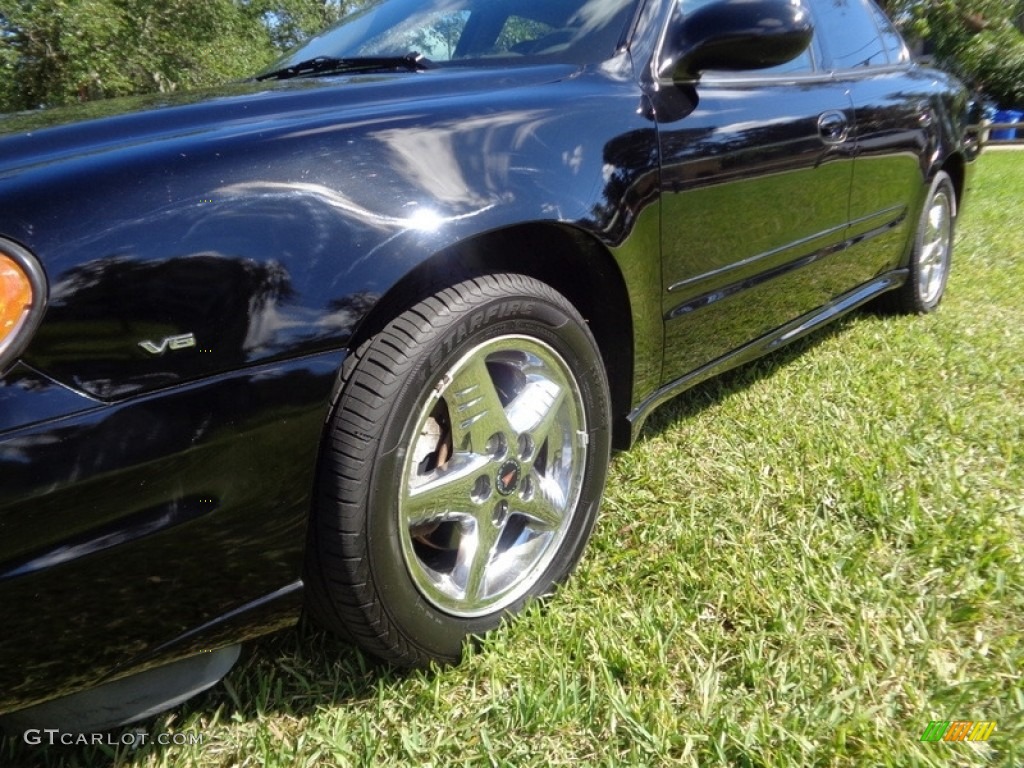 2004 Grand Am SE Sedan - Black / Dark Pewter photo #47