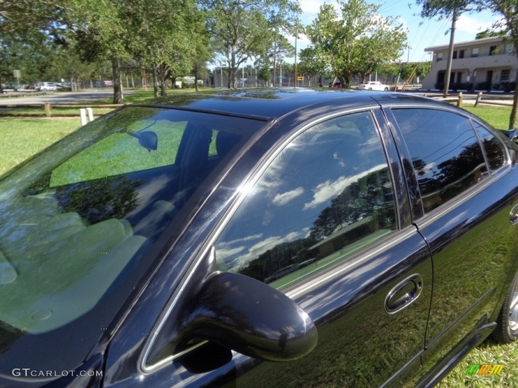 2004 Grand Am SE Sedan - Black / Dark Pewter photo #55