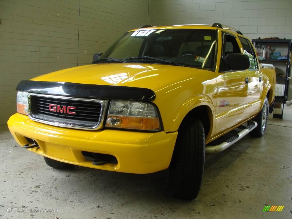 2002 Sonoma SLS Crew Cab 4x4 - Flame Yellow / Graphite photo #1