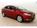 2016 Ruby Red Ford Focus Titanium Sedan  photo #1