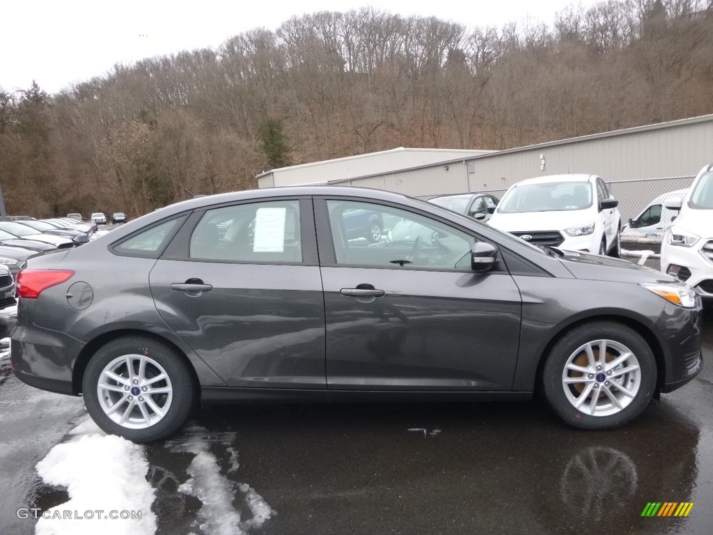 2018 Focus SE Sedan - Magnetic / Charcoal Black photo #1