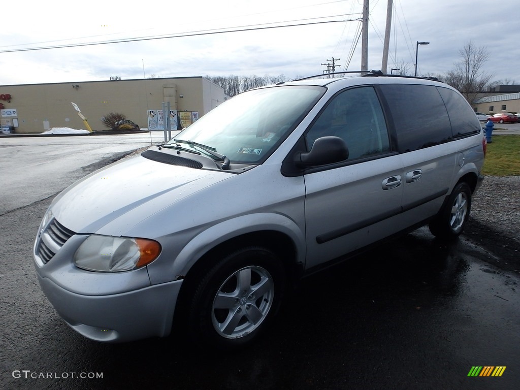 Bright Silver Metallic Dodge Caravan