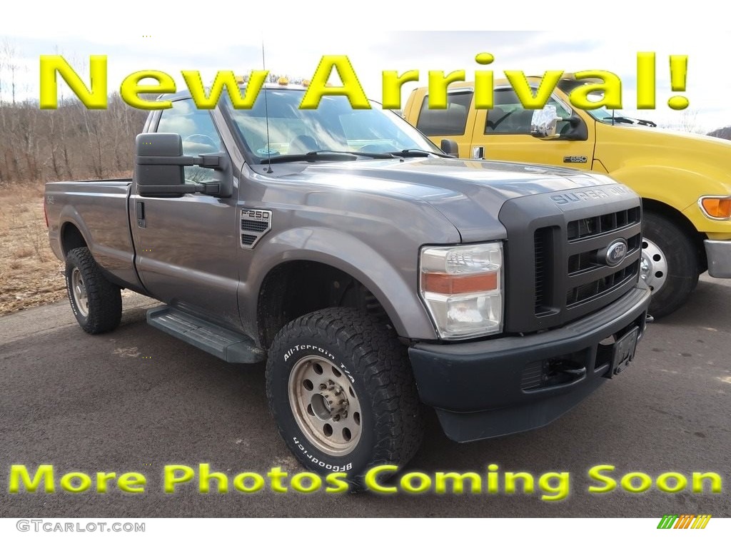 2009 F250 Super Duty XL Regular Cab 4x4 - Sterling Grey Metallic / Medium Stone photo #1