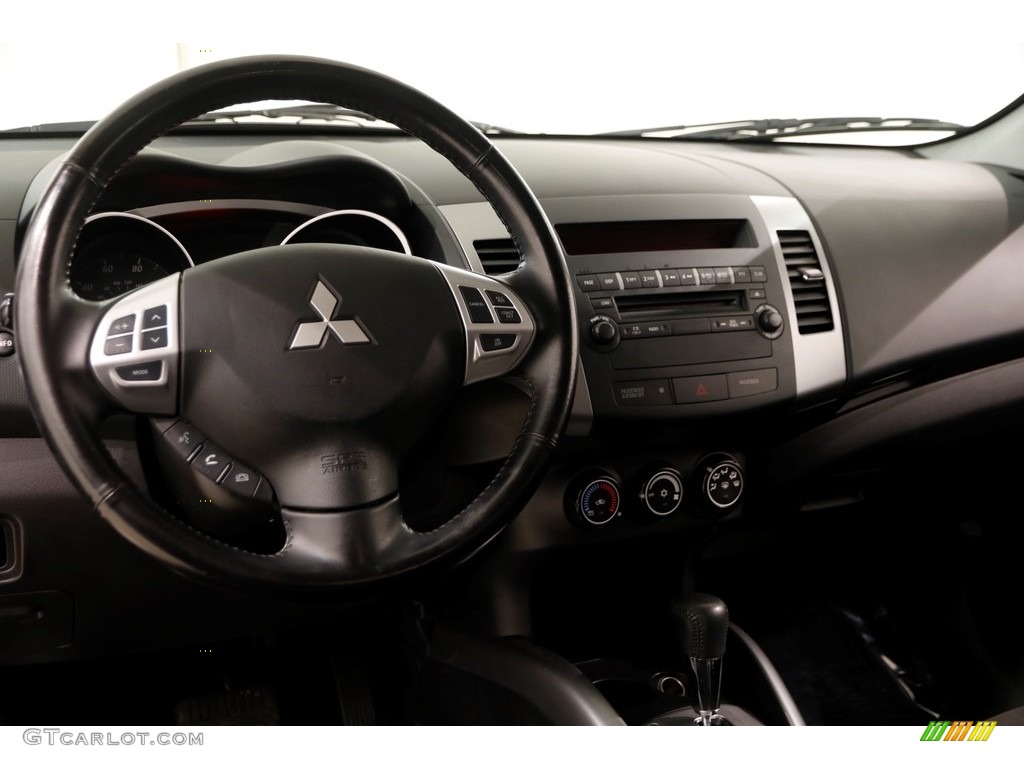 2010 Outlander ES - Labrador Black Pearl / Black photo #6