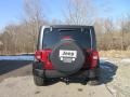 2012 Deep Cherry Red Crystal Pearl Jeep Wrangler Unlimited Sport 4x4  photo #6