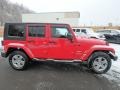 2010 Flame Red Jeep Wrangler Unlimited Sahara 4x4  photo #7