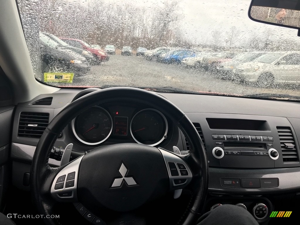 2009 Lancer GTS - Rotor Glow Orange Metallic / Black photo #17