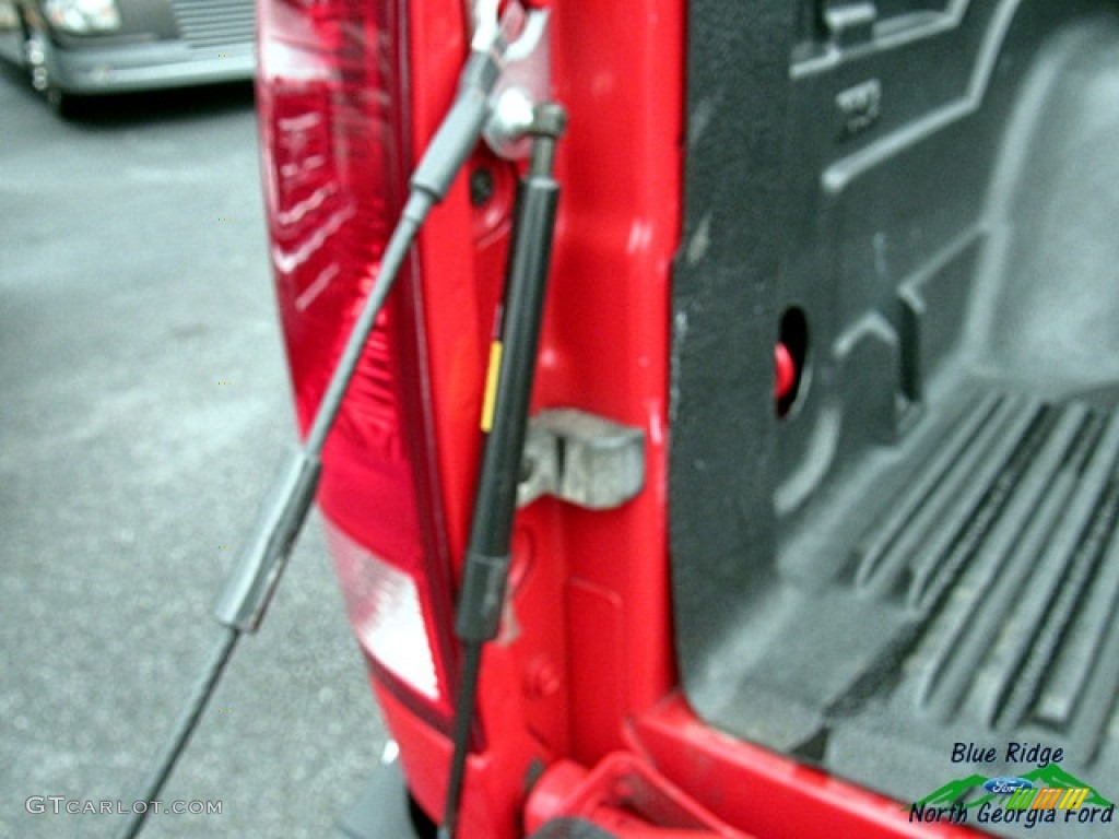 2014 1500 SLT Quad Cab 4x4 - Flame Red / Black/Diesel Gray photo #16