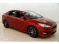 2015 Ruby Red Metallic Ford Focus SE Sedan #125521324