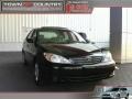 2003 Black Toyota Camry LE  photo #1