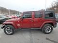 2010 Red Rock Crystal Pearl Jeep Wrangler Unlimited Sahara 4x4  photo #2