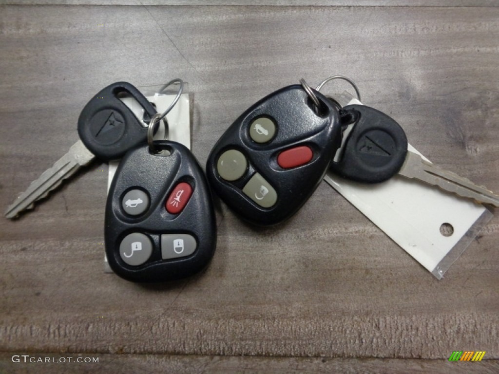 2004 Grand Am SE Sedan - Black / Dark Pewter photo #78