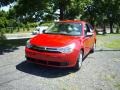 2008 Vermillion Red Ford Focus SE Coupe  photo #2