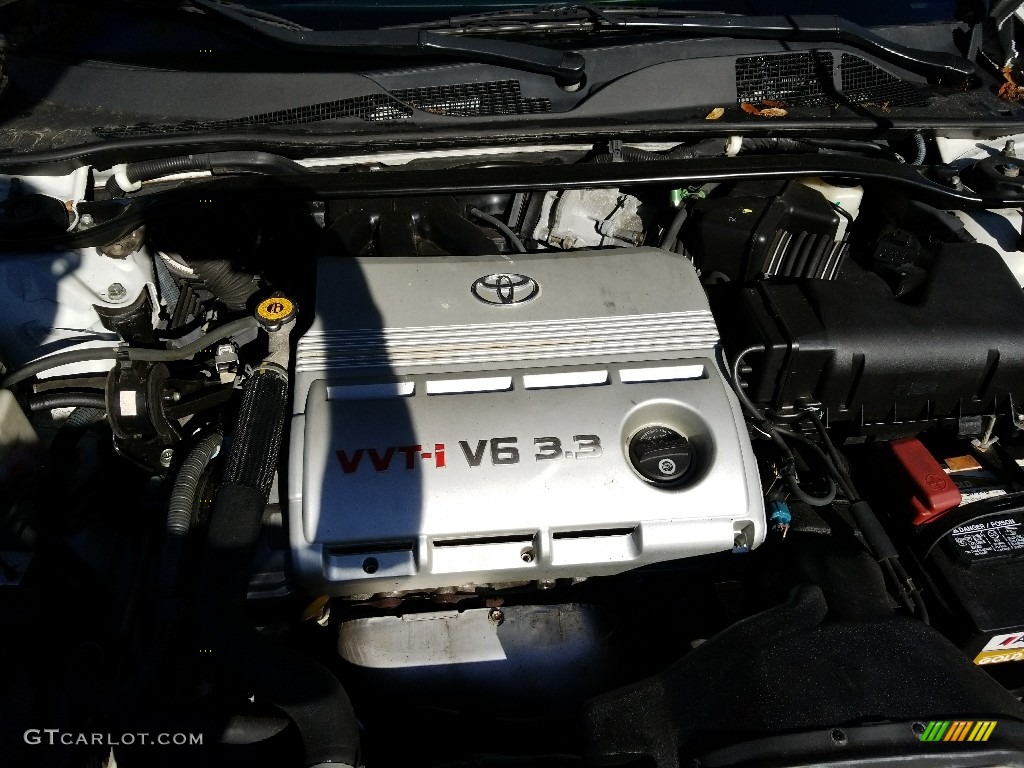 2005 Solara SE V6 Coupe - Arctic Frost Pearl White / Dark Stone photo #21