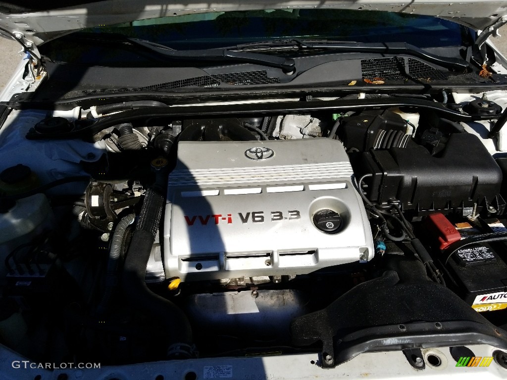 2005 Solara SE V6 Coupe - Arctic Frost Pearl White / Dark Stone photo #22