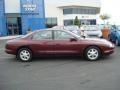 1999 Burgundy Red Metallic Oldsmobile Aurora   photo #2