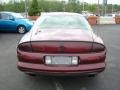 1999 Burgundy Red Metallic Oldsmobile Aurora   photo #4