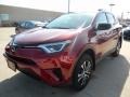 2018 Ruby Flare Pearl Toyota RAV4 LE  photo #1