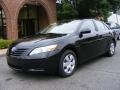 2009 Black Toyota Camry LE  photo #1