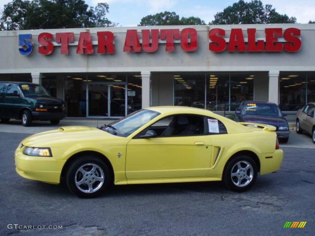 2002 Mustang V6 Coupe - Zinc Yellow / Dark Charcoal photo #1