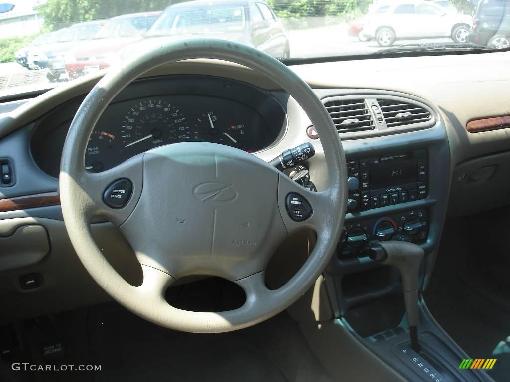 1999 Cutlass GL - Dark Cherry Metallic / Neutral photo #11