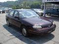 1999 Dark Cherry Metallic Oldsmobile Cutlass GL  photo #18