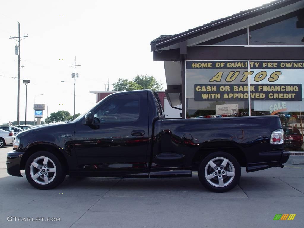 2002 F150 SVT Lightning - Black / SVT Medium Graphite photo #1
