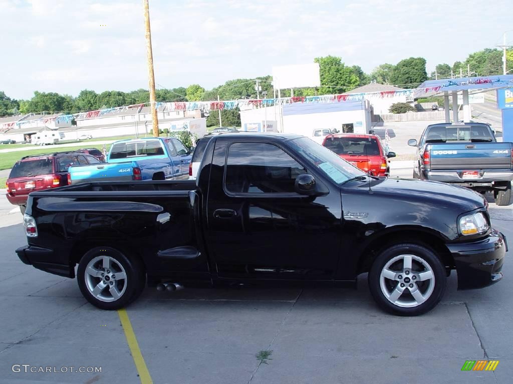 2002 F150 SVT Lightning - Black / SVT Medium Graphite photo #4